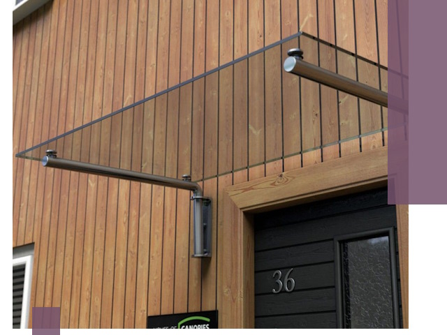 Стеклянные козырьки на входы и фасады в Новом Уренгое